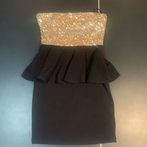 Strapless gold peplum dress